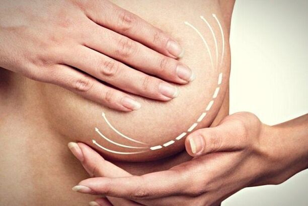 étalez la crème sur vos seins pour les agrandir